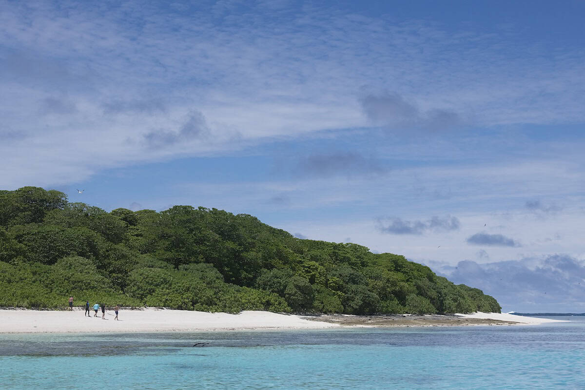 Blue waters of Maninita Island, a bird sanctuary in Tonga
