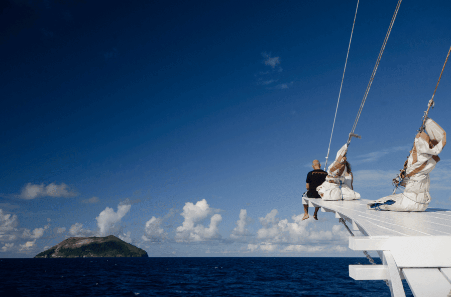 snorkeler on liveaboard in Raja Ampat